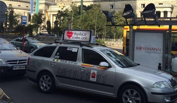 Taxi top advertising sign
